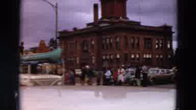 Minnesota USA (1969): Vintage Truck With People On Top In A Cannon Pulls A Trailer