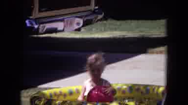 White Sands Florida-1970: Kids Playing In Inflatable Pool With Pink Ball