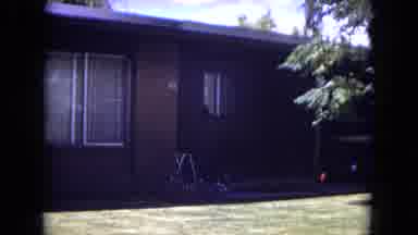 White Sands Florida (1970): A Child Plays In A Small Pool On The Lawn Of A Home