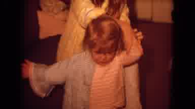 White Sands Florida (1970): A Child Putting On A Dressing Gown