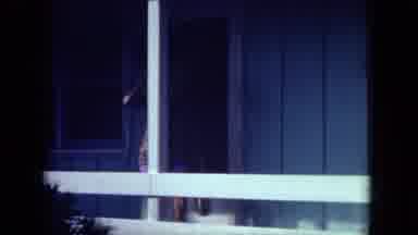 Mississippi (1971): Woman Excitedly Waves At Camera When Leaving Her Residence For