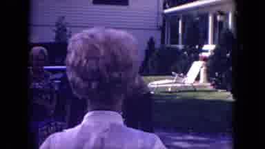 Mississippi (1971): Women And A Man Carry Luggage Outside Of A House
