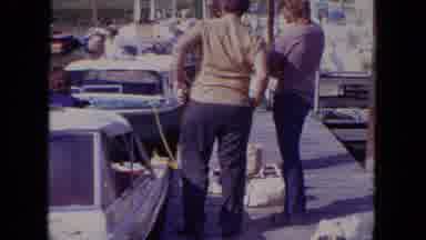 Mississippi (1971): A Sunny Day Where People Are Standing On The Dock Near The