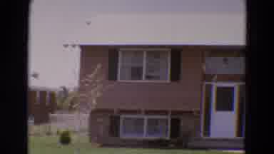 Diller Nebraska USA (1968): A Simple Home With Four White And Black Shuttered