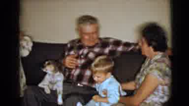 Clarksdale Arizona (1968): Two Children And A Dog Sit On A Couch With Grandparents