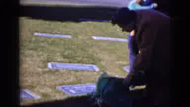 Clarksdale Arizona (1968): Elder Woman Lays Flowers On A Loved Ones Grave And