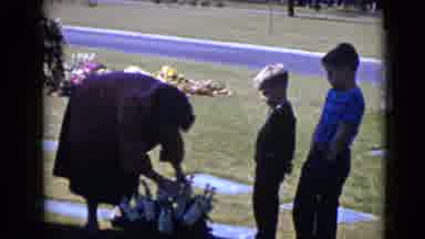 Clarksdale Arizona (1968): Elder Woman Tends The Flowers As The Children Watch As
