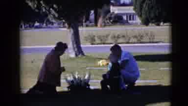 Clarksdale Arizona (1968): A Family Paying Respect To A Deceased In A Cemetery