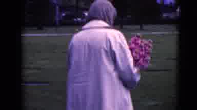 Clarksdale Arizona (1968): Woman Walking Through Cemetery With Arms Full Of