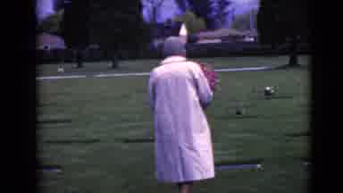 Clarksdale Arizona (1968): Older Woman Flowers Cemetery Searching Grave Site