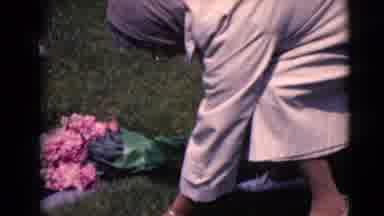 Clarksdale Arizona (1968): Gravesites Replacing Flowers Mourning Woman