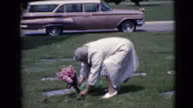 Clarksdale Arizona (1968): Elder Woman Tends The Flowers That Sit On The Headstone
