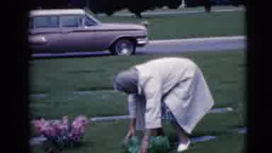 Clarksdale Arizona (1968): An Elderly Lady Visiting And Laying Flowers On A Grave