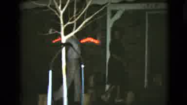 Clarksdale Arizona USA (1968): Man And Women Out At Night Going Into Their Home
