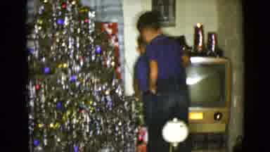 Clarksdale Arizona USA (1968): Two Young Boys Snooping At The Christmas Gifts