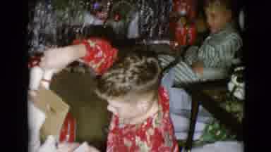 Clarksdale Arizona USA (1968): Two Small Boys Unwrap Presents And Pull Out A Set