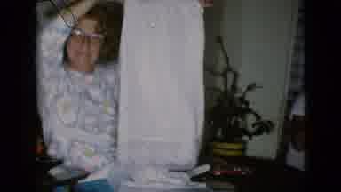 Clarksdale Arizona USA (1968): Family Happily Unwrapping Christmas Gifts Together