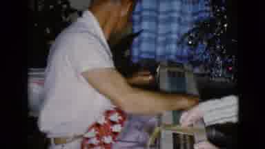 Clarksdale Arizona USA (1968): Father And Child Happily Opening Christmas Presents