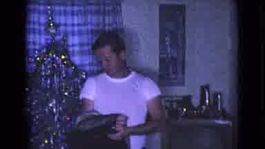 Clarksdale Arizona USA (1968): Man Wearing White Pants And Shirt Takes Off Black