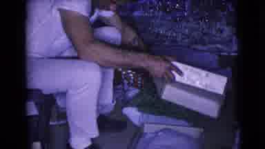 Clarksdale Arizona USA (1968): A Young Man Opening A New Gift He Recently Received