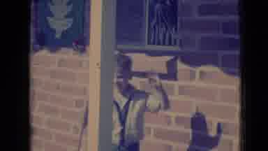 Clarksdale Arizona USA (1968): Boy Wearing Blue And White Shirt Swings Around