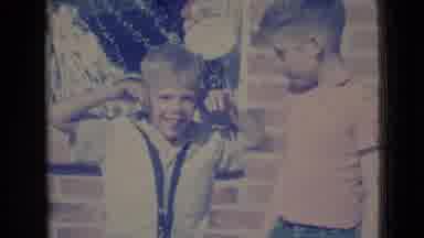 Clarksdale Arizona USA (1968): Little Kids Outside Making Faces To A Camera
