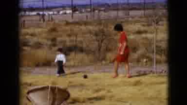 Clarksdale Arizona USA (1968): A Mom And Her Child Walking In A Field