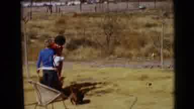 Clarksdale Arizona USA (1968): A Mom With Her Two Boys And A Dog In A Field Next