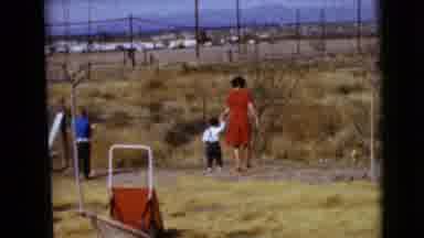 Clarksdale Arizona USA (1968): Cut From Child Sticking Out His Tongue To Mother