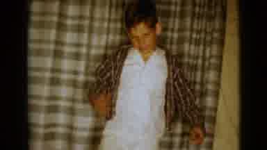 Clarksdale Arizona USA (1968): Boy Takes Off Brown And White Coat Unhappy And With
