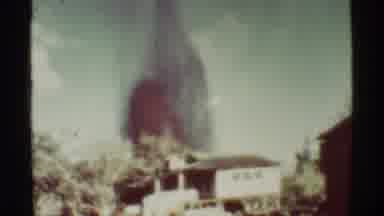 Mauna Ulu Hawaii (1971): A Fire In A House During The Day With Black And Red