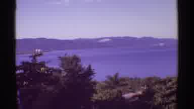 Mauna Ulu Hawaii (1971): A View Of The Ocean And Palm Trees