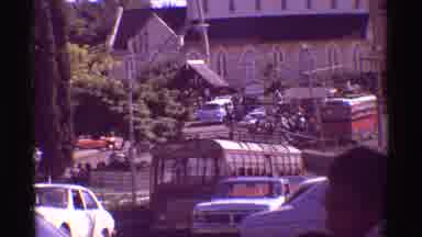 Mauna Ulu Hawaii (1971): People Sitting And Watching Vehicles Passing By On Road