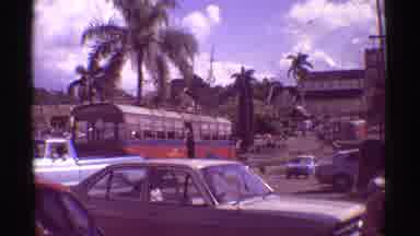 Mauna Ulu Hawaii (1971): Man Getting Into Van Near A Highway In A Foreign Country
