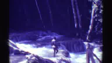 Mauna Ulu Hawaii (1971): Person Wearing Yellow Shorts Dives Into Swift Running