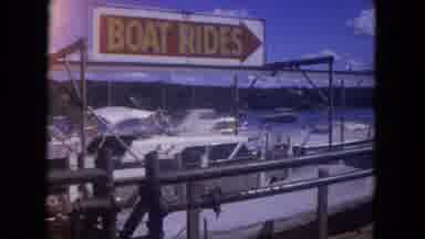 Mississippi River USA-1972: Sign Announces Boat Rides At Small Marina With Classic Boats
