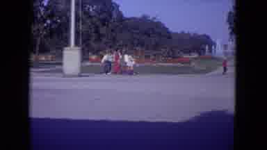 Lincoln Park Illinois USA (1972): A Person Poses By A Sign While Other People Walk