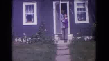 Lake Geneva Wisconsin USA (1972): Cat Watches A Woman Talk To Someone As She