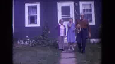 Lake Geneva Wisconsin USA (1972): Family In Front Of Blue House