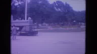 Lake Geneva Wisconsin USA (1972): People Are Watching A Train Moving Down A Street