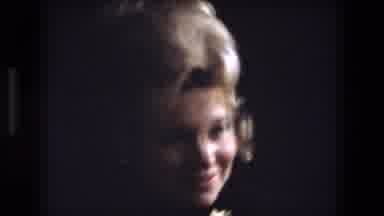 Fort Wayne Indiana (1973): A Woman Smiles While Holding A Baby Next To Another