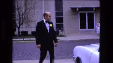Fort Wayne Indiana (1973): Man Dressed In Evening Dress Gets Ready To Go Out With
