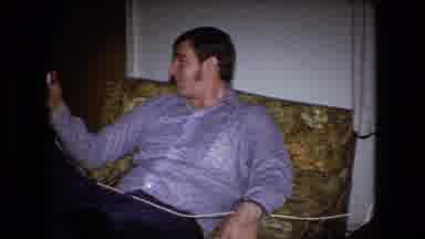 Fort Wayne Indiana (1973): Two Men Smile As They Have A Conversation Nearby A