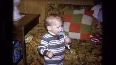 Fort Wayne Indiana (1973): Little Boy Holding Toy And A Woman