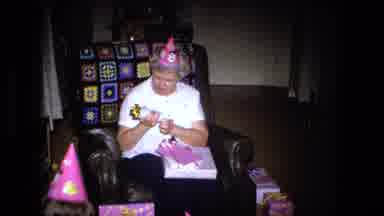 Fort Wayne Indiana (1973): Grandmother Opens Present In Front Of Three