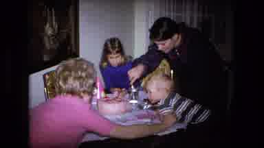 Fort Wayne Indiana (1973): Two Women And Two Children Gathered Around A Table