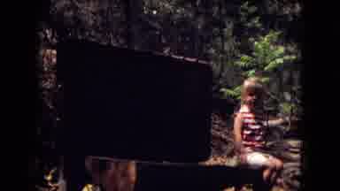 Gila National Forest New Mexico (1973): A Girl In The Forest Sitting Near The