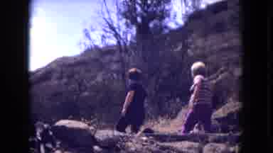 Gila National Forest New Mexico (1973): Two People Walk Along A Cliffside Hiking