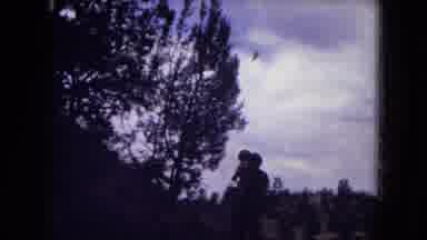 Gila National Forest New Mexico (1973): Two People Walk On Dirt Trail On A Cloudy