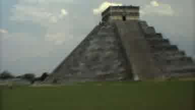 Mexico City (1973): People Walk On A Green Field Towards An Aztec Pyramid